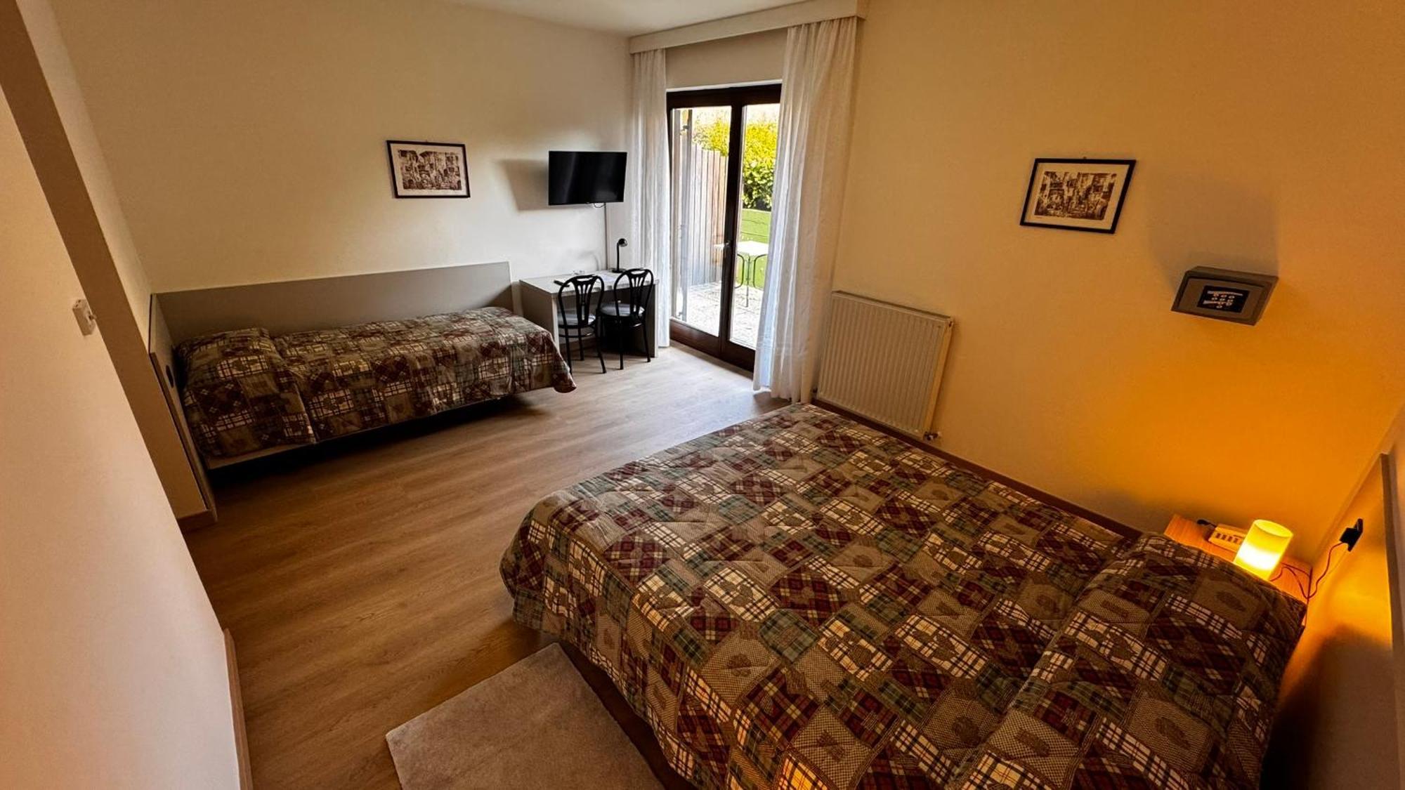Albergo Stella Alpina Tenno Værelse billede